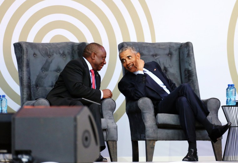 Image: South African President Cyril Ramaphosa talks to former U.S. President Barack Obama