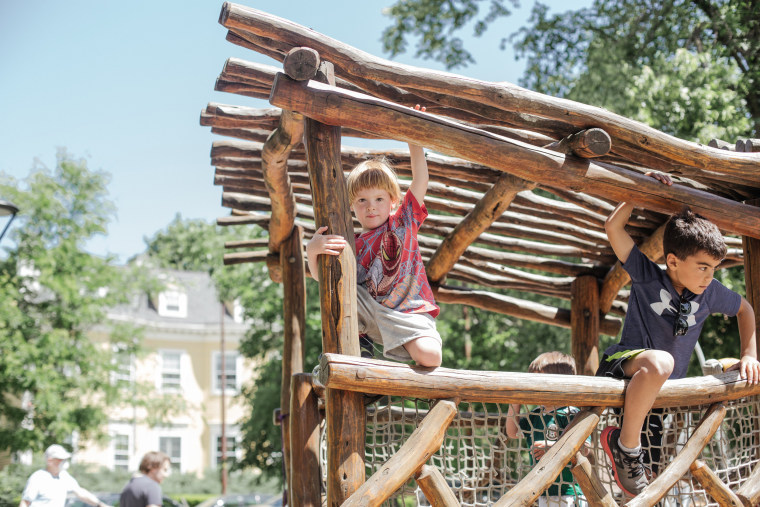 Image: Kadyn, 3, plays in the park in Cambridge