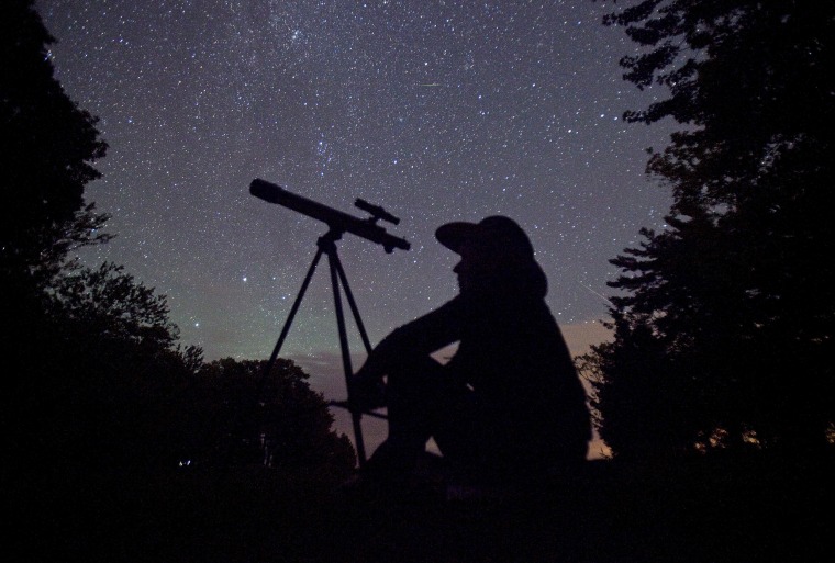 A stargazer waits for the Perseid meteor shower to begin near Bobcaygeon