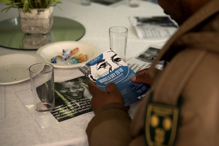 Correctional Services staff listen to speeches during the launch of the Prison to Pipeline program offering in person college courses in prison to facilitate re-entry, on the centennial of Nelson Mandela's Birthday at Brandvlei Correction Centre in Worce