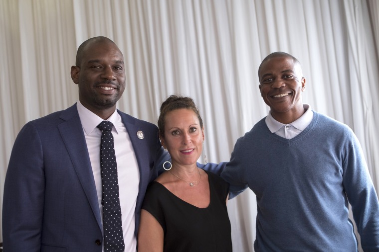 Professor Baz Dreisenger with her first graduate Devon Simmons of the Prison to Pipeline Program in America (to her left), and a South African recent graduate and ex-offender Morgan (to her left) during the launch of the first P2P program in South Africa,