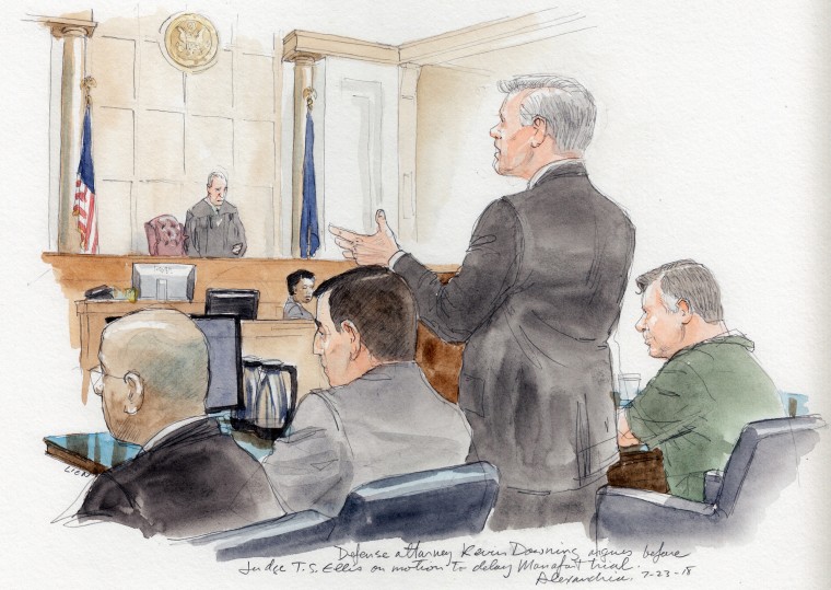 Image: Defense attorney Kevin Downing, standing, argues before judge T.S. Ellis on a motion to delay Paul Manafort's trial