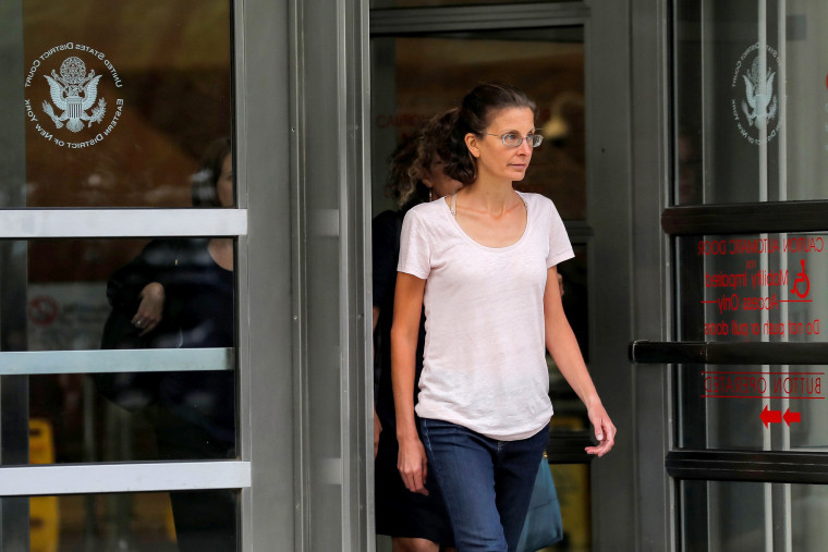 Image: Clare Bronfman, an heiress of the Seagram's liquor empire, exits following her arraignment on charges of racketeering and conspiracy in relation to the Albany-based organization Nxivm at the United States Federal Courthouse in Brooklyn at New York