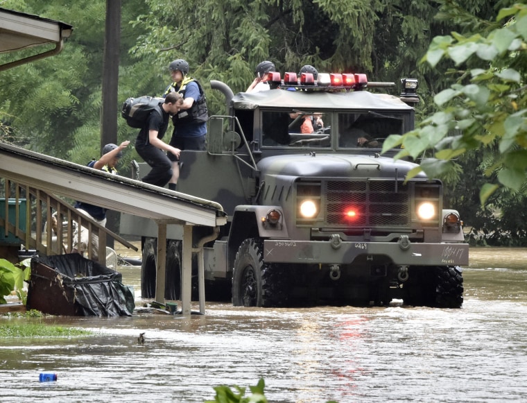 Image: Firefighters from Wrightsville Fire Company use a five ton truck to evacuate residents from homes along flooded Drager Road in Columbia, Pennsylvania on July 25, 2018.