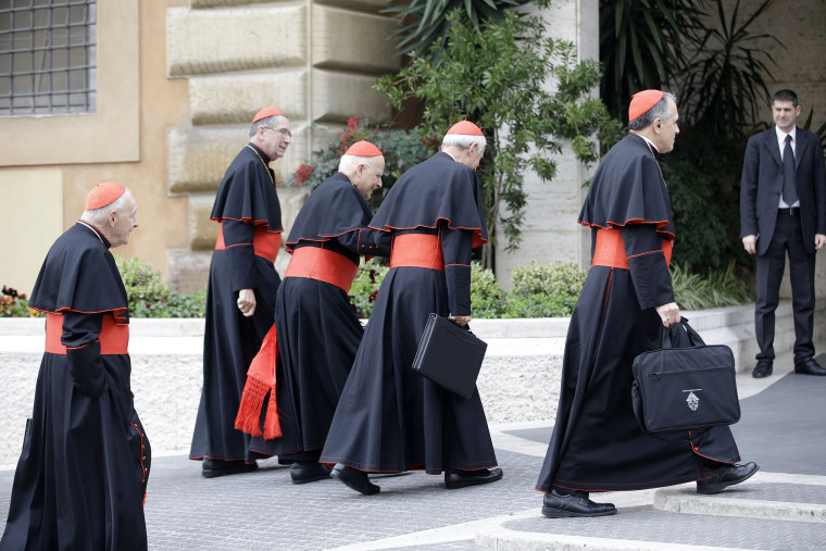 Image: From left, U.S. Cardinals Theodore McCarrick, Roger Mahoney, Francis George, Donald Wuerl and Daniel Di Nardo arrive for a meeting, at the Vatican on March 5, 2013.
