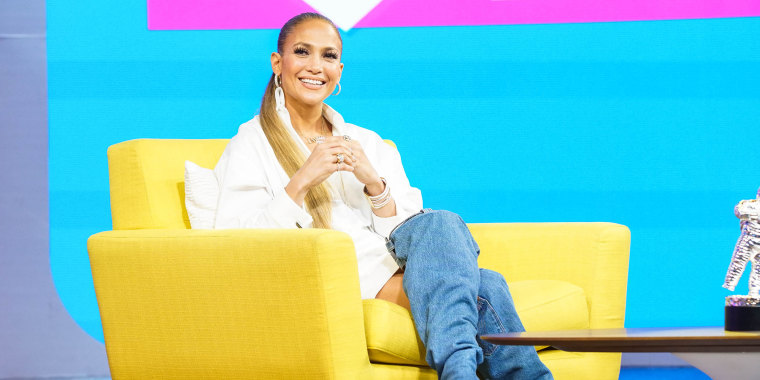 Jennifer Lopez is owning her thigh-high denim boots. 