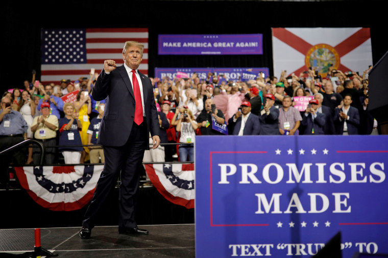 Image: Trump acknowledges crowd during MAGA rally in Tampa