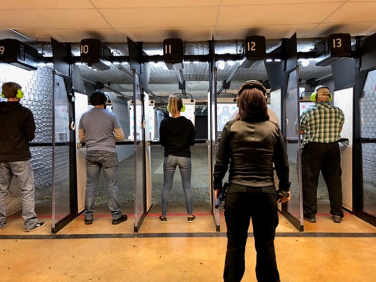 An instructor at Bristlecone Shooting, Training and Retail Center in Denver teaches a recent concealed-carry course in which students learn how to safely discharge firearms in self-defense.