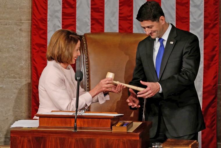 U.S. House Speaker Ryan receives the gavel from House Democratic Leader Pelosi during opening session of the new Congress on Capitol Hill in Washington