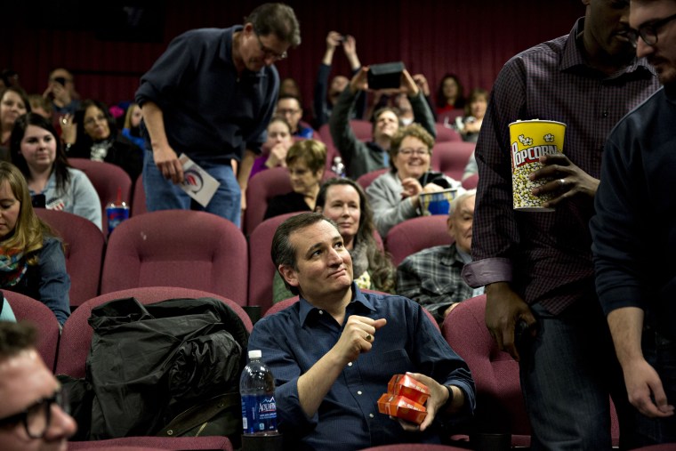 Ted Cruz takes his seat during a campaign event at a showing of the film "God's Not Dead 2"