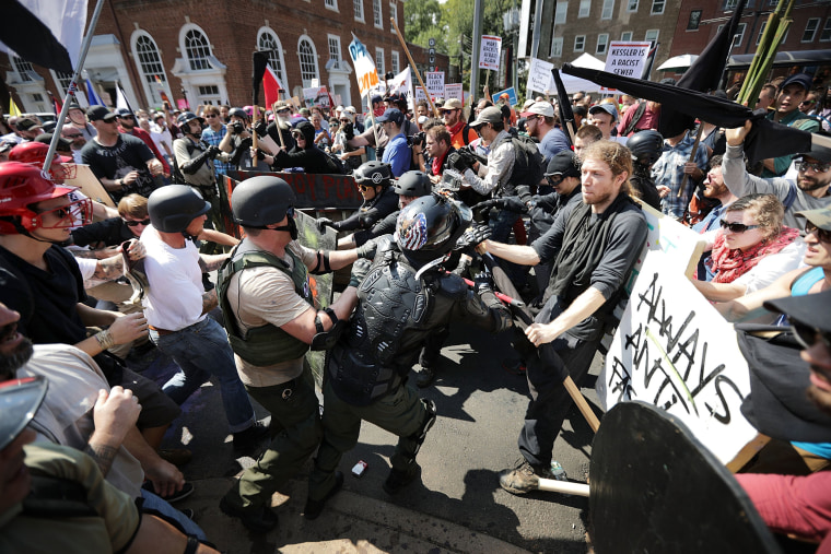 Image: Protesters clash as the \"Unite the Right\" rally in Charlottesville