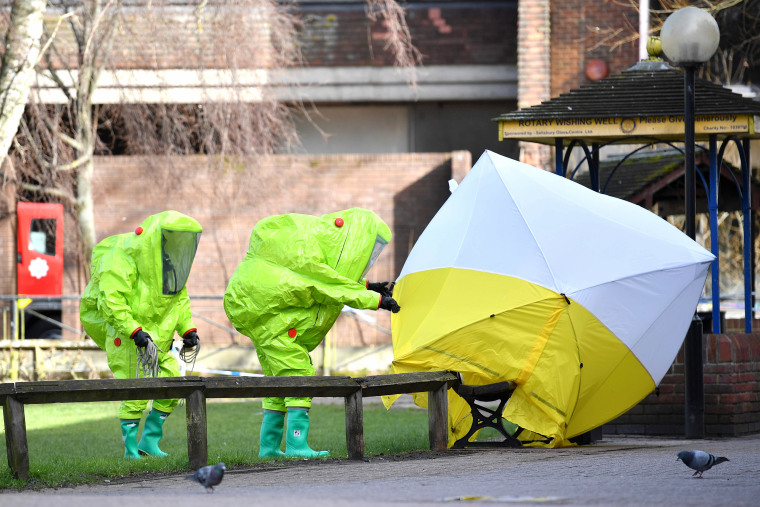 Image: Emergency officials work at the scene of an investigation in Salisbury