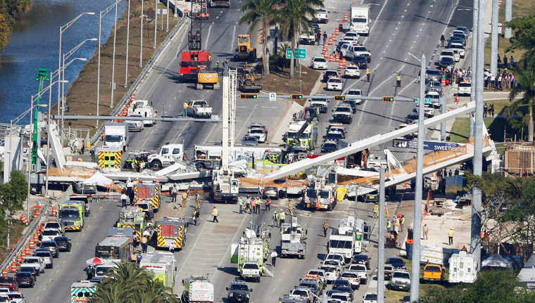 Image: Aerial view shows a pedestrian bridge collapsed at Florida International University in Miami