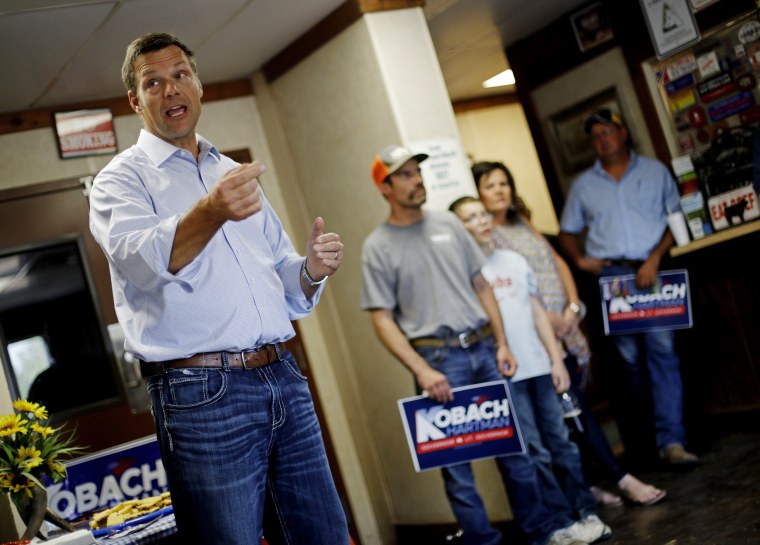 Image: Kansas Secretary of State Kris Kobach addresses supporters during a campaign stop