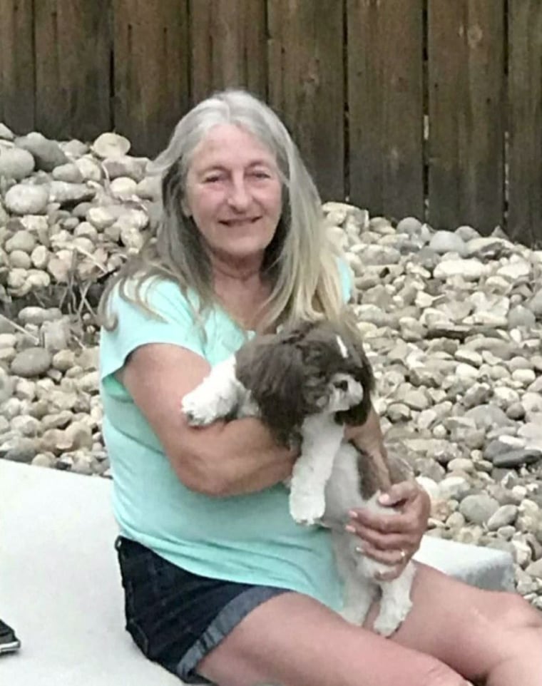 Sharon Larson and her dog Beau.