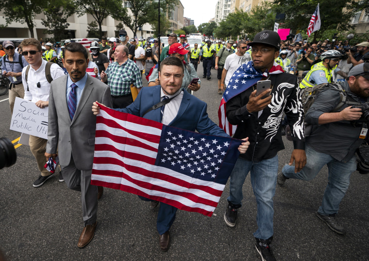 Image: Jason Kessler, center, and members of the alt-right march to the White House