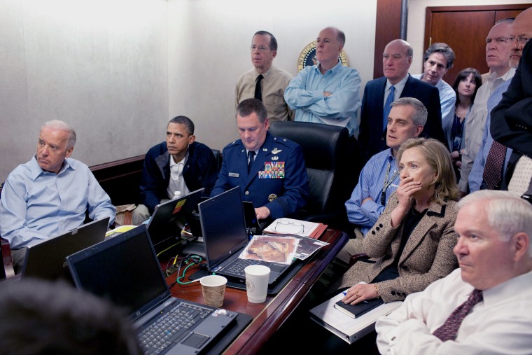 Image: Obama and his staff watch an update on the mission against Osama bin Laden in the Situation Room of the White House