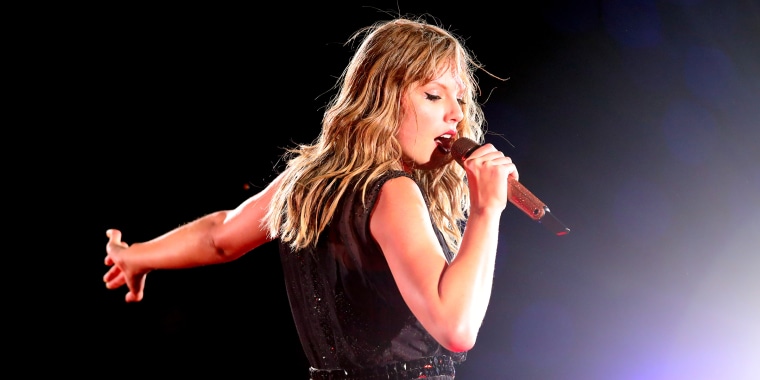 Taylor Swift tearing up on stage on the anniversary of her sexual assault trial.