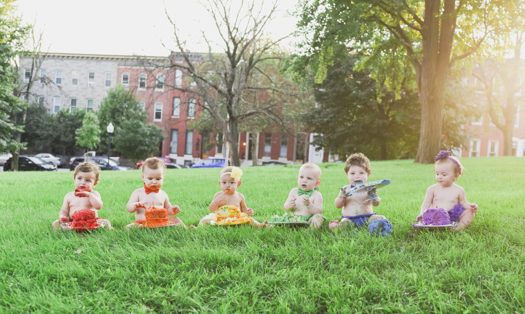 To celebrate her rainbow baby, Charlie's, first birthday, Alicia Lewis and her friends staged a multi-baby, rainbow photo shoot.