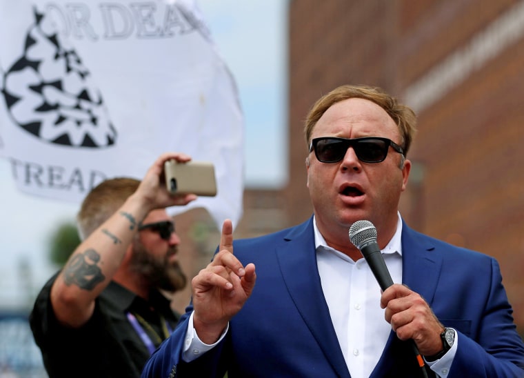 Image: FILE PHOTO: Alex Jones from Infowars.com speaks during a rally in support of Republican presidential candidate Donald Trump near the Republican National Convention in Cleveland