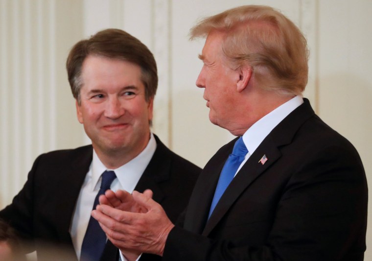 Image: President Trump and his nominee for the U.S. Supreme Court Brett Kavanaugh talk at announcement event in East Room of the White House in Washington