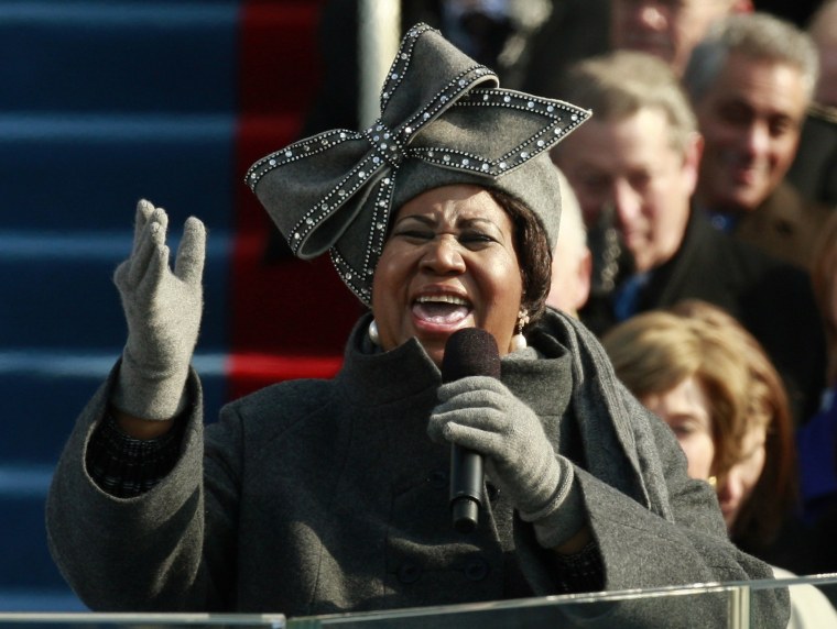 Image: Aretha Franklin signs during the inauguration ceremony for President-elect Barack Obama in Washington