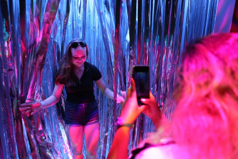 Image: Jaia Delizo takes a picture of Amanda Svensson