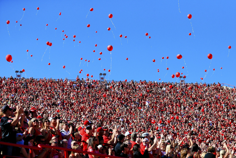 Image: Balloons are released after a Nebraska touchdown against Southern Miss