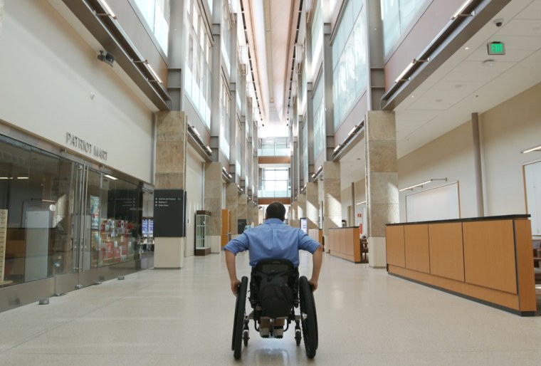 Image: Former Army helicopter pilot David Ortiz tours the new medical center before it opened