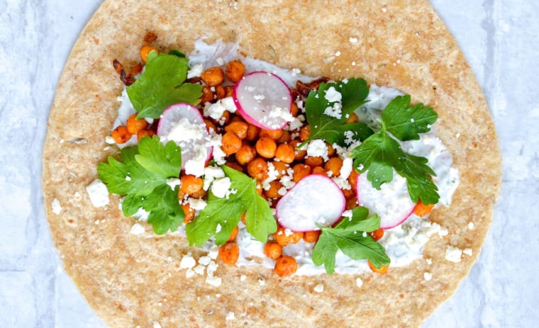 Parsley may look similar to cilantro, but it has a much milder flavor that makes a nice addition to sandwiches like this Spiced Chickepea Wrap.