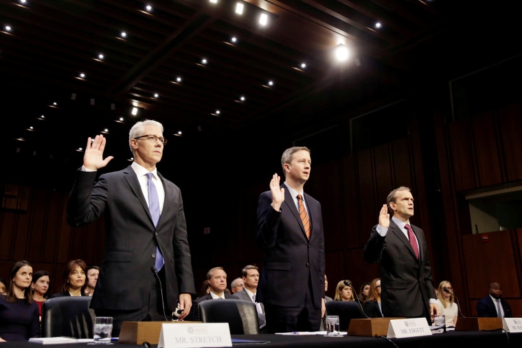 Image: Colin Stretch of Facebook, Sean Edgett of Twitter and Richard Salgado of Google are sworn in prior to testifying before Senate Intelligence Committee in Washington