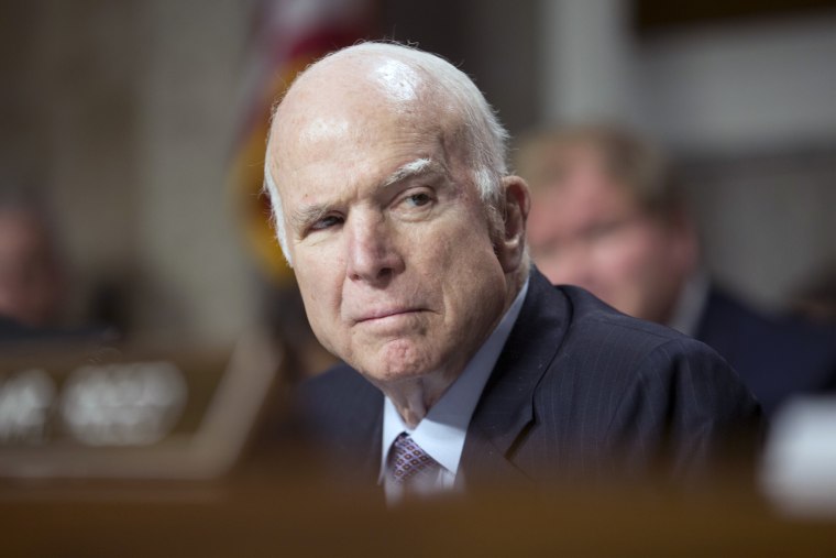 Image: Senator John McCain attends an Armed Services Committee hearing on Capitol Hill