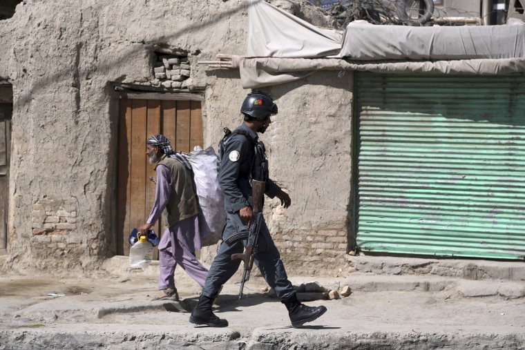 Image: An Afghan security officer in Kabul
