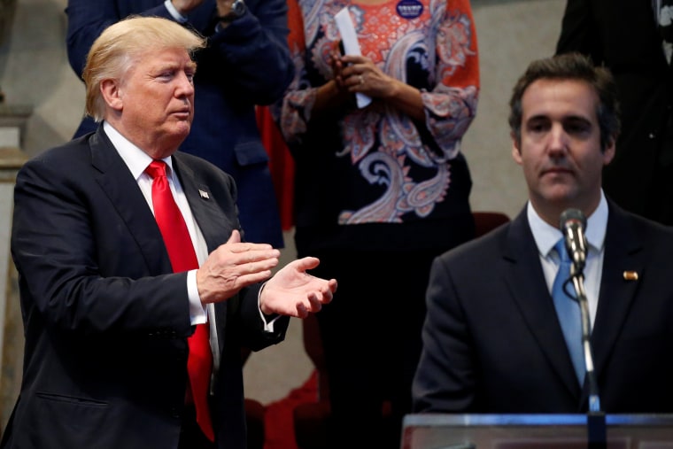 Trump appears with Cohen during a campaign stop at the New Spirit Revival Center church in Cleveland Heights, Ohio