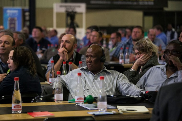 Image: A farmer attends "The Land Solution" conference