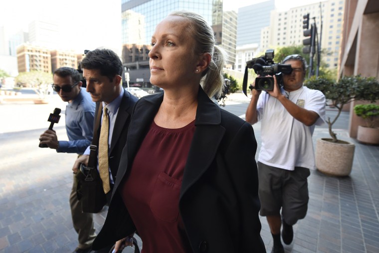 Margaret Hunter, center, the wife of U.S. Rep. Duncan Hunter, arrives for an arraignment hearing