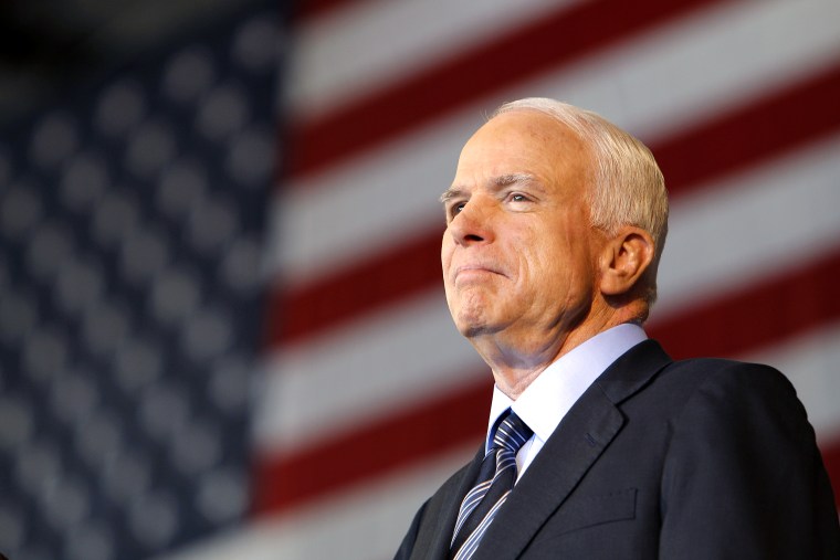 U.S. Republican presidential nominee Senator McCain listens at campaign rally in Colorado Springs