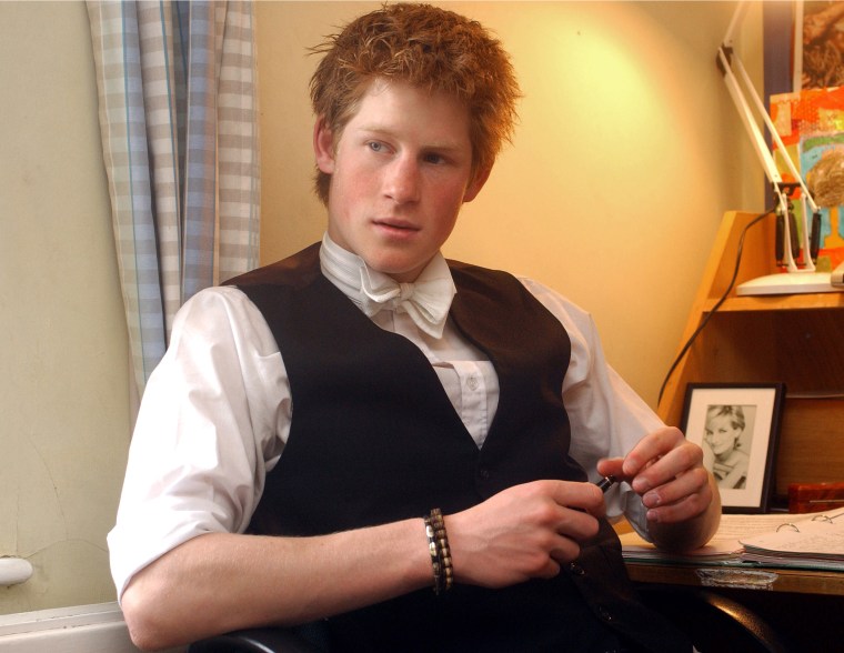 Prince Harry Sits At Desk