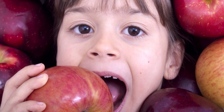 Those who eat organic apples, core and all, get 10 times the bacteria