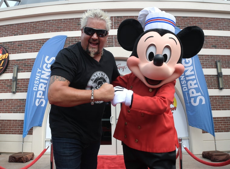 Chef Mickey Mouse made a special appearance at the opening of Fieri's new Disney Springs restaurant.