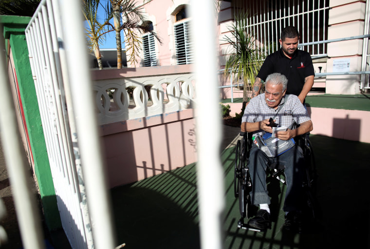 Image: Nicky Sanchez Quiles, a resident of the San Rafael nursing home and a dialysis patient, is taken to a hospital in Arecibo