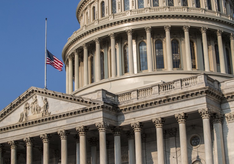 Image: The American flag flies at half-staff at the Capitol in honor of Sen. John McCain