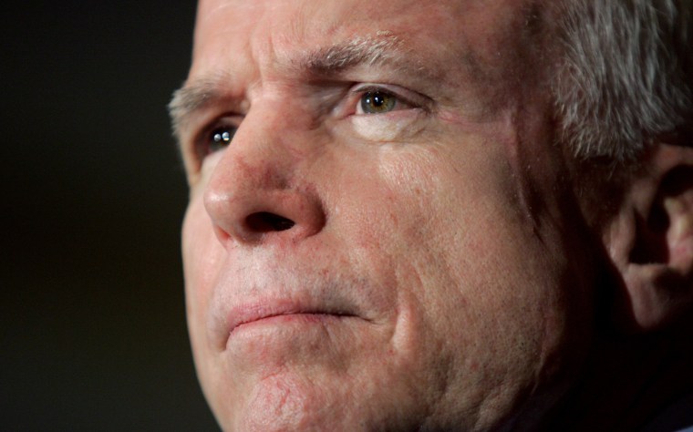 Image: Senator John McCain listens to a question