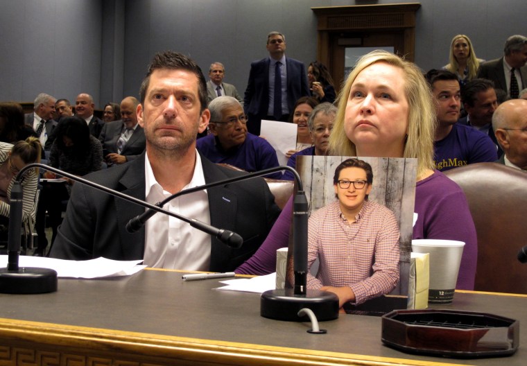 Stephen and Rae Ann Gruver sit in a House committee room