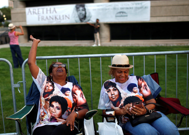 Image: Fans wait in line outside the Charles H. Wright Museum of African American History