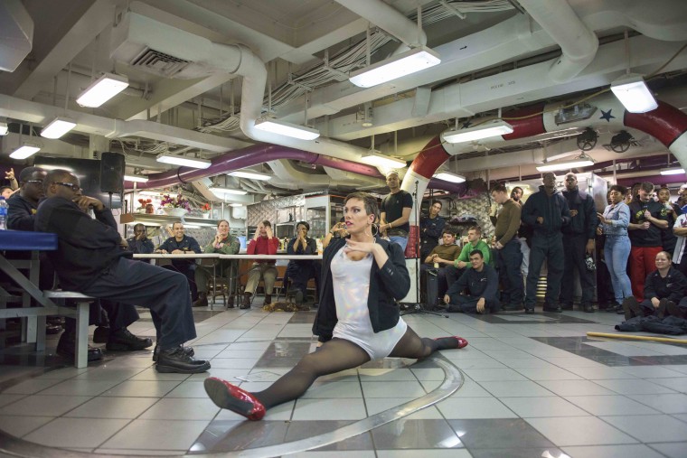 Yeoman 3rd Class Joshua J. Kelley, from Berwick, Pennsylvania, performs during the Morale, Welfare and Recreation (MWR) Lip Sync Battle