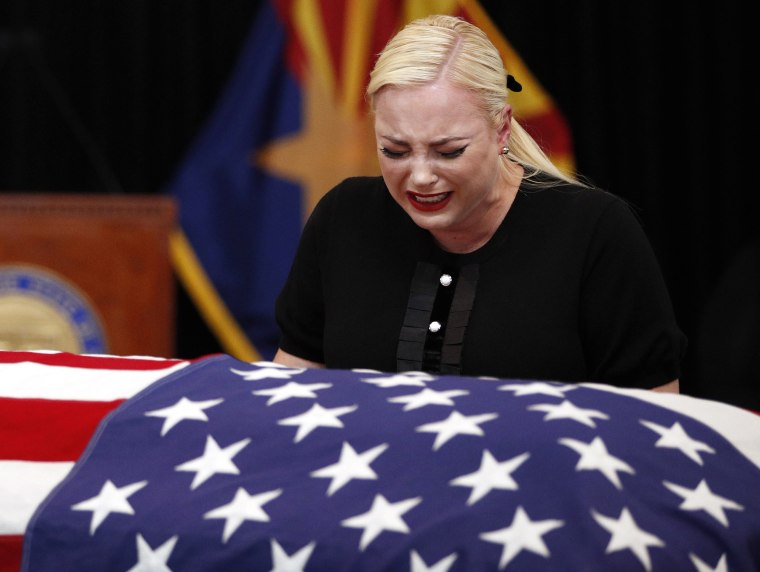 Image: Meghan McCain, daughter of Sen. John McCain, R-Ariz. cries at the casket of her father