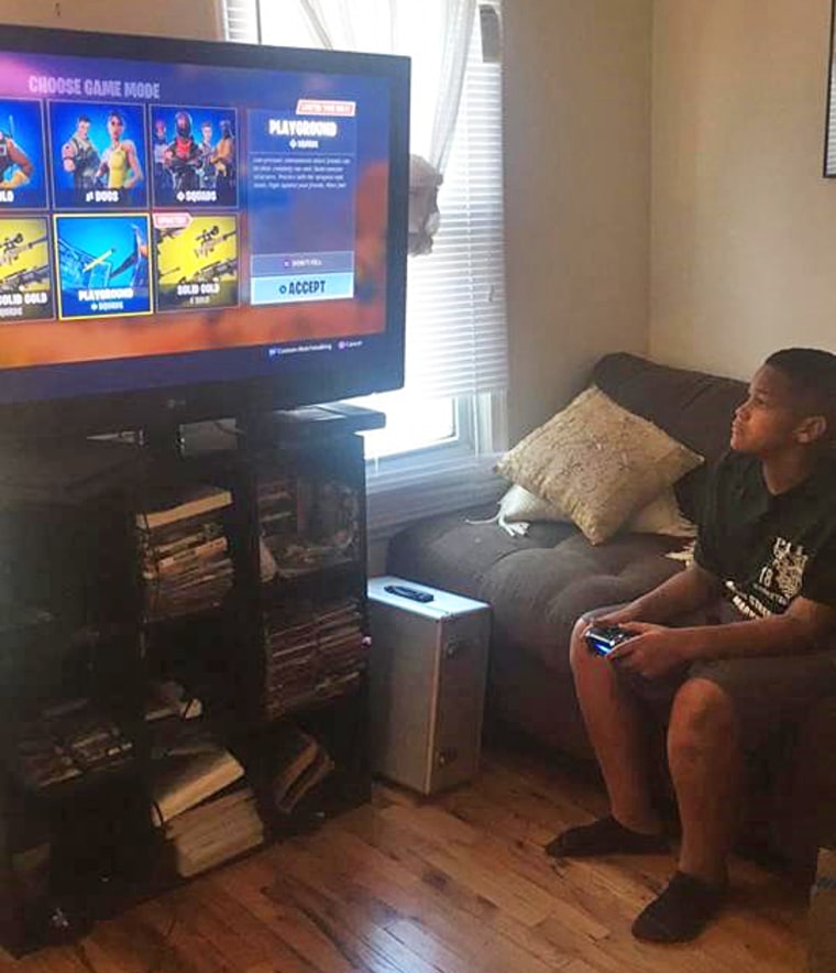 11-year-old Marcus Robert McElrath playing Fortnite at his home in Smryna, Delaware.