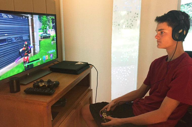 Wyatt Kosmerl, 14, playing Fortnite at his home in Avondale Estates, Georgia.