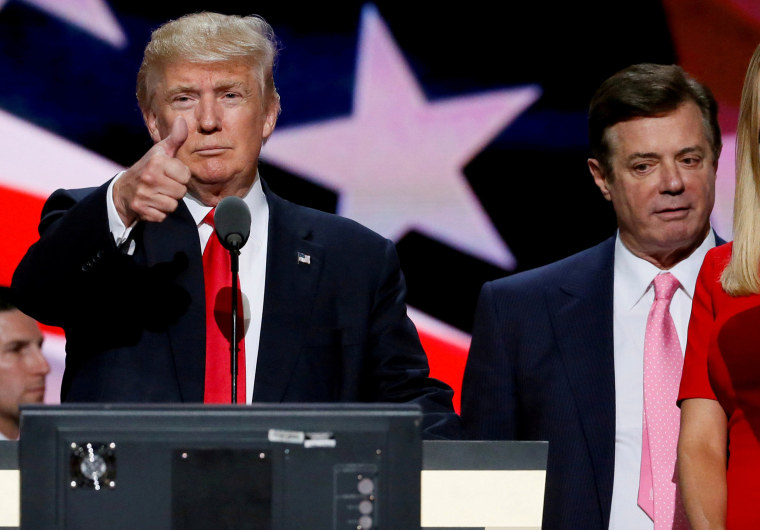 Image: Republican presidential nominee Donald Trump gives a thumbs up as his campaign manager Paul Manafort looks on during Trump's walk through at the Republican National Convention in Cleveland